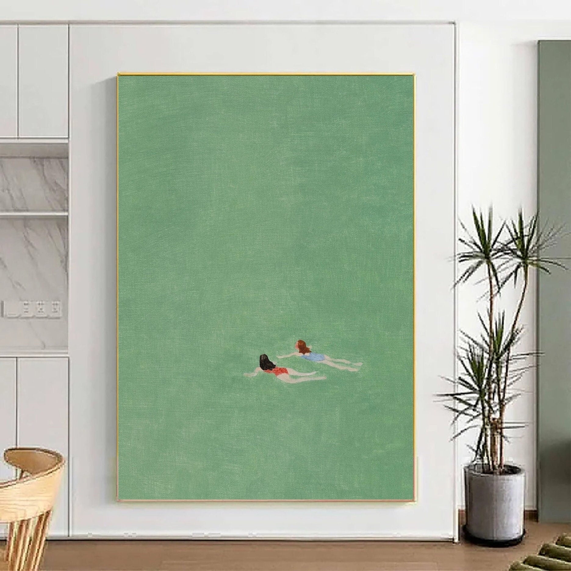 Emerald Depths: Overhead View of Swimmers in Tranquil Green Water #MM655